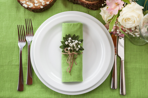 green dining setting at wedding
