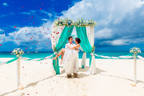 bride groom just married beach